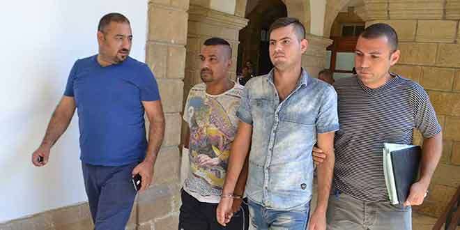 Salih Ahmet and Mehmet Akpinar pictured handcuffed. Picture: Cyprus Mail