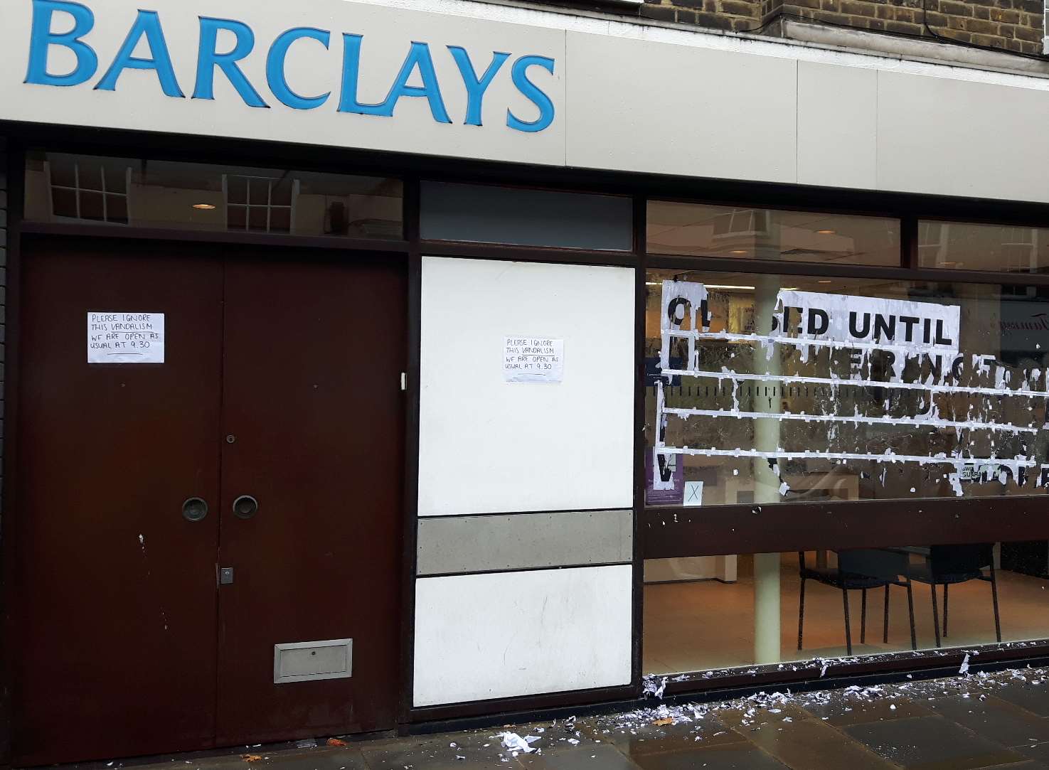 The remains of the protest poster at Barclays Bank, Sheerness, today after staff had tried to remove the damage