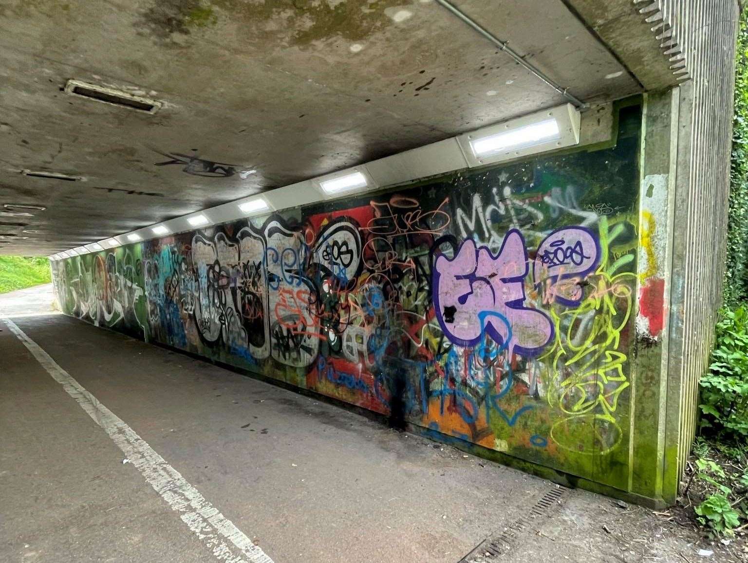 The underpass would often flood but now KCC have fixed the drainage problems. The graffiti is now set to be replaced with designs inspired by nature Picture: Dover Smart Project