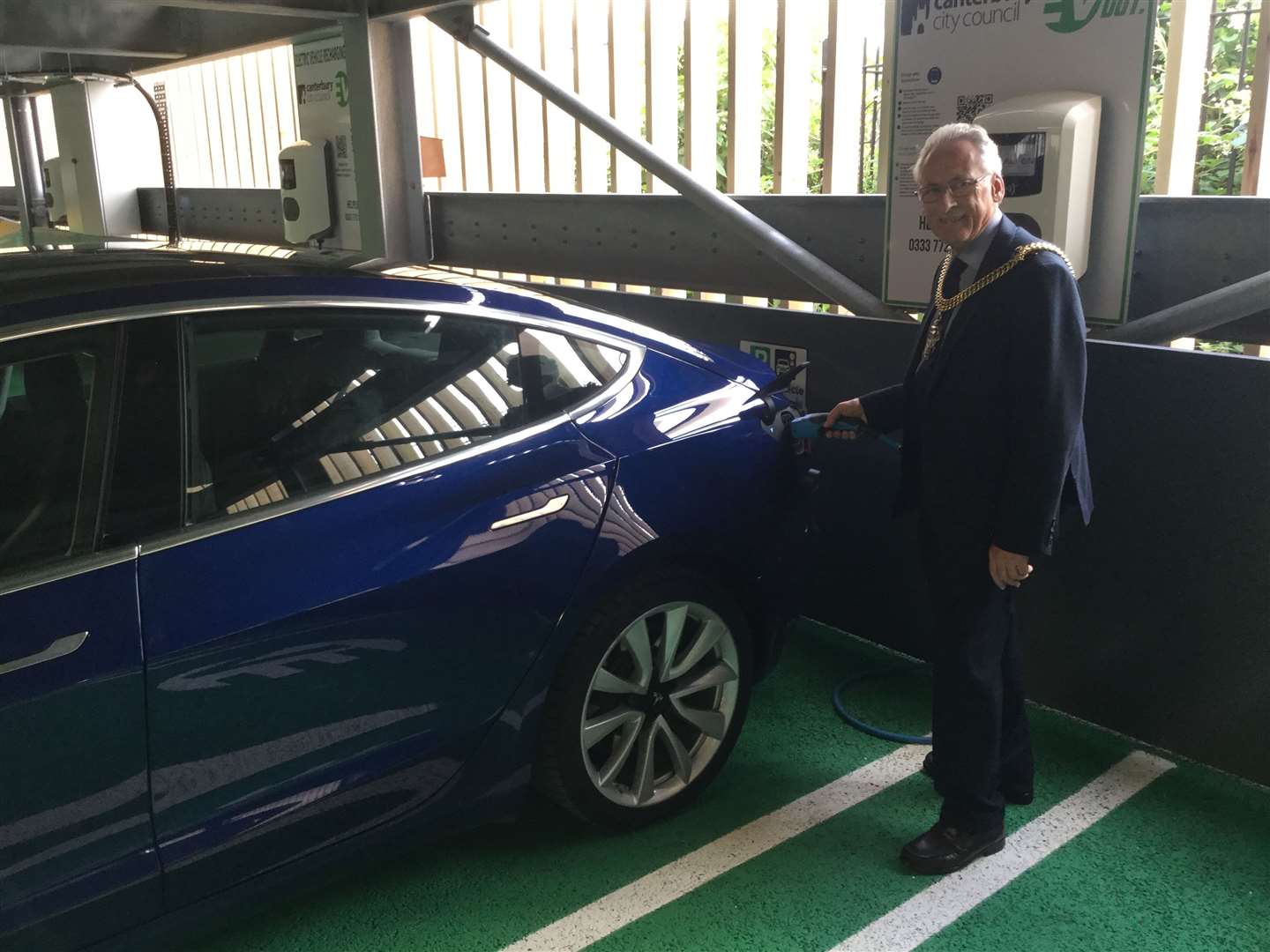 Lord Mayor Terry Westgate getting to grips with one of the electric charging points at Station Road West car park