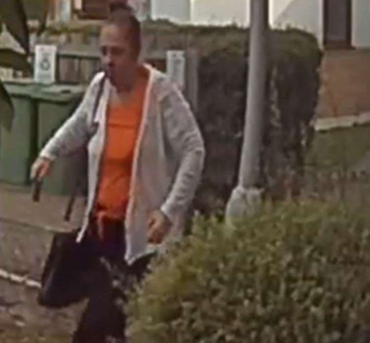 Kathleen Perry caught on CCTV leaving the home of one of her victims