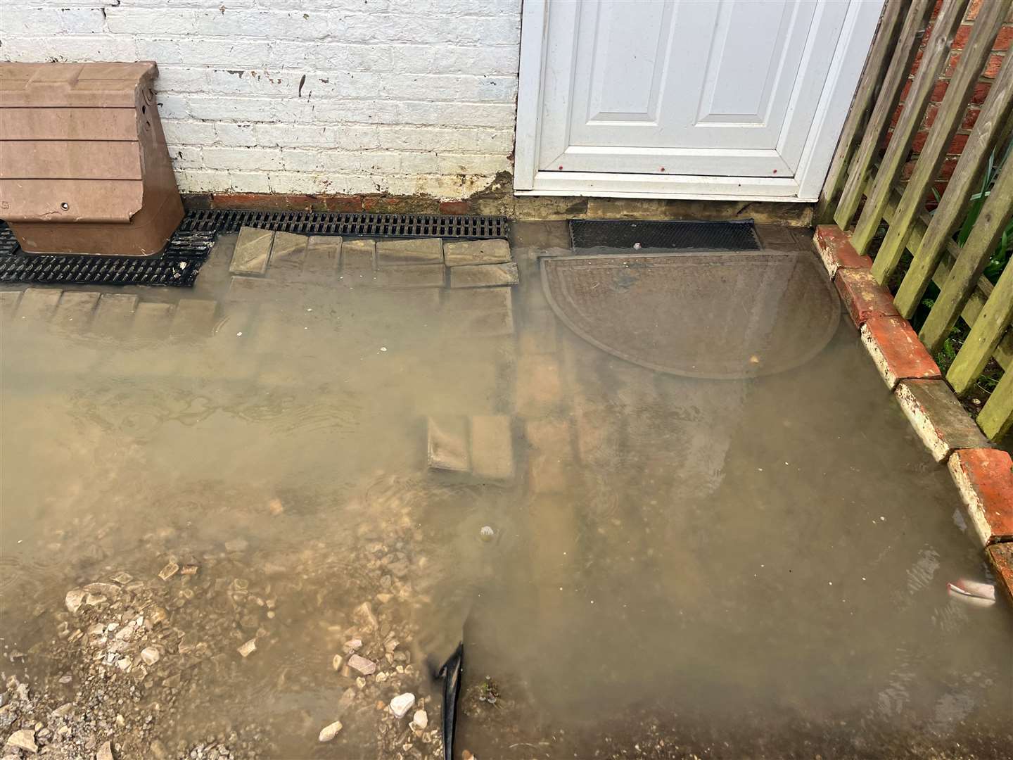 Water is coming up to one resident’s front door, but has not gone into their property