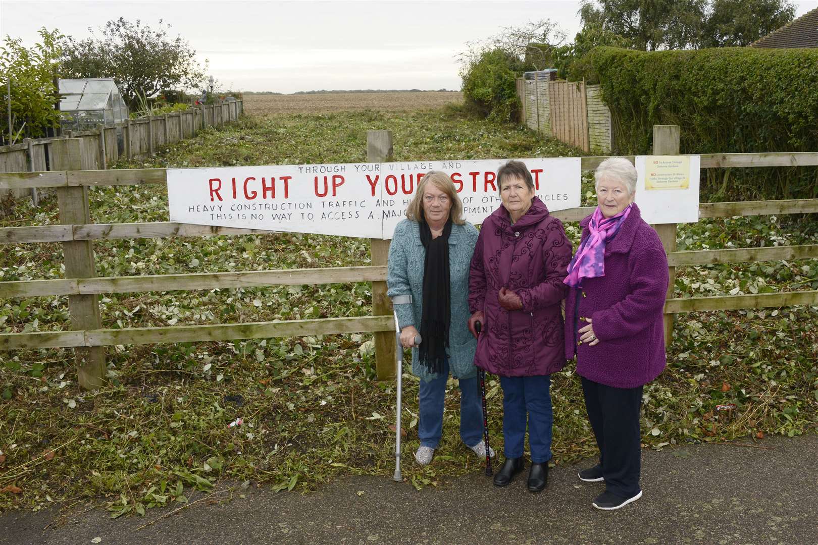 Villagers Veronica Lewis, Maria Stewart and Jackie Weeden by one of the proposed entrances to the new development