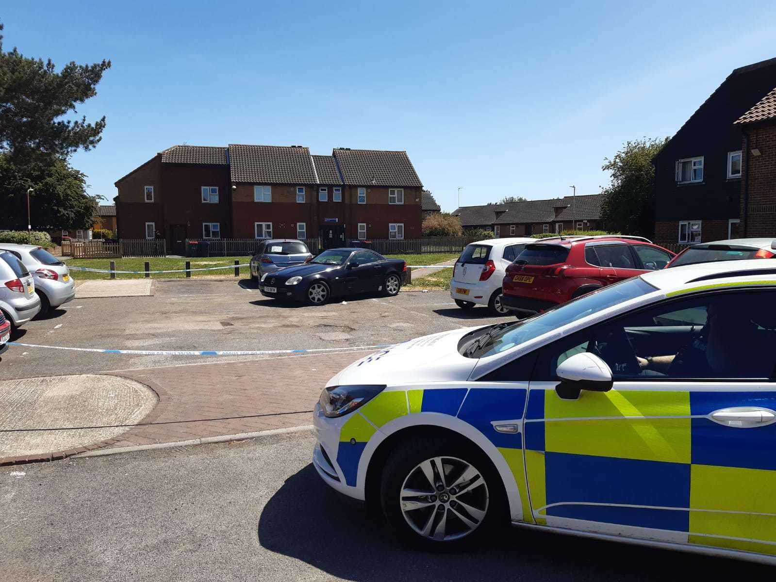 Police have taped off a car park in Collins Road, Herne Bay