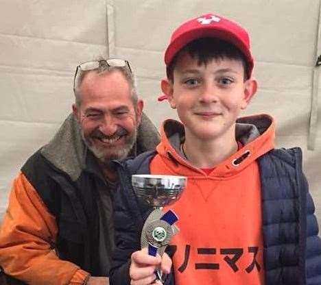 Finn with his first place trophy and mechanic dad Steve Weeden. Picture: Heidi Cockerton