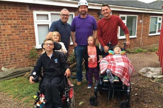 The Ratcliffe family with DIY SOS presenter Nick Knowles