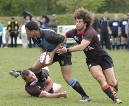Canterbury (blue) look to go on the offensive against Blackheath