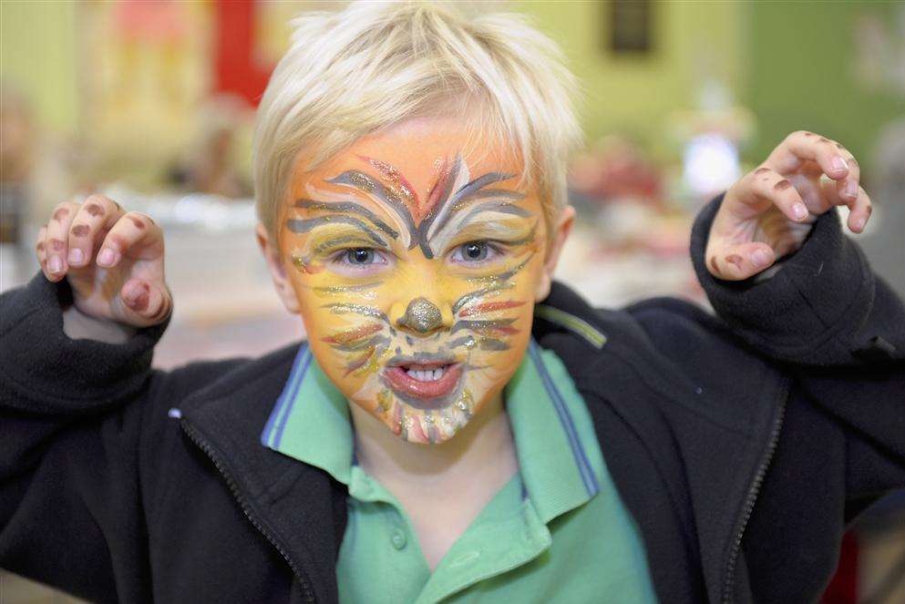 Tiger Thomas Longshaw, six, has a grrrrrreat time at St George's Church Christmas fair, at the church hall, Church St, Gravesend