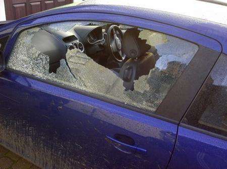 The smashed passenger window on Troy Wareing's Corsa