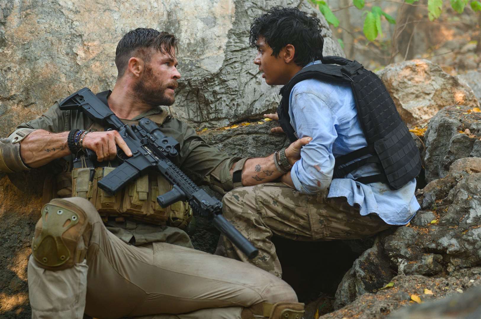 Extraction. Pictured: Chris Hemsworth as Tyler Rake and Rudhraksh Jaiswal as Ovi Picture: PA Photo/Netflix/Jasin Boland