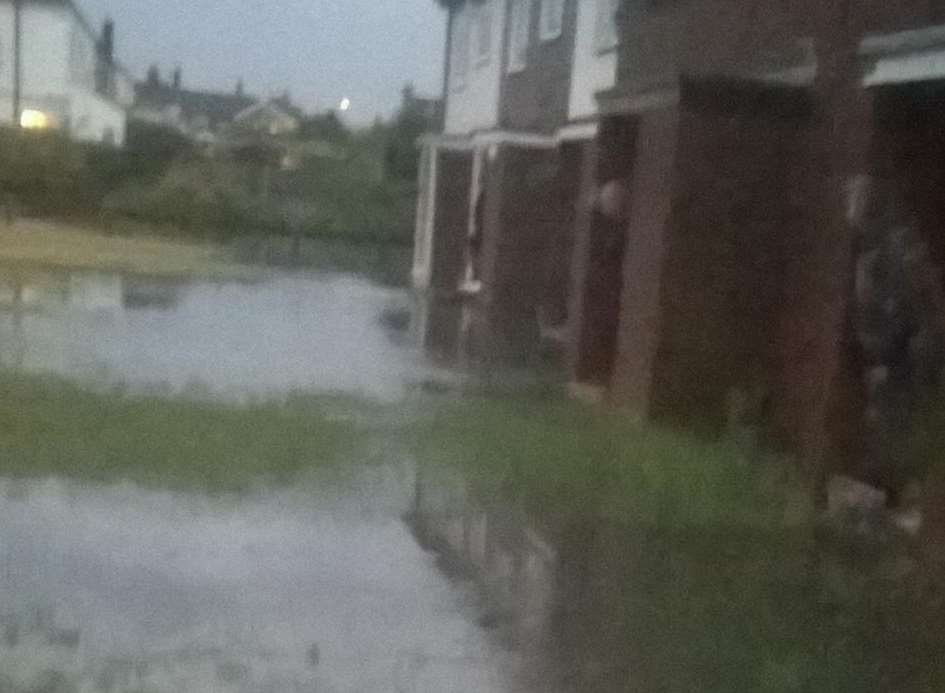 Flooding in Castlemere Avenue, Queenborough