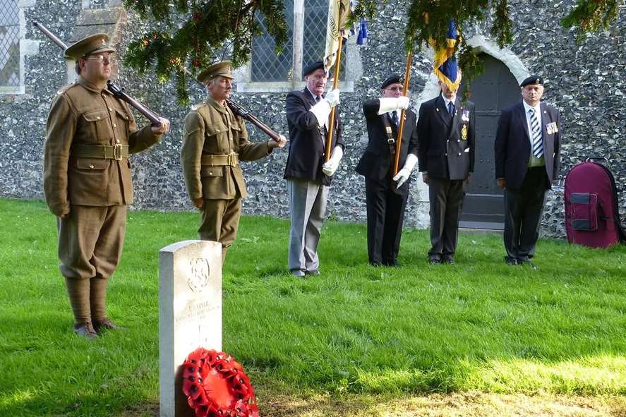 The Queen's Own Buffs at the grave of Private Edward Carver
