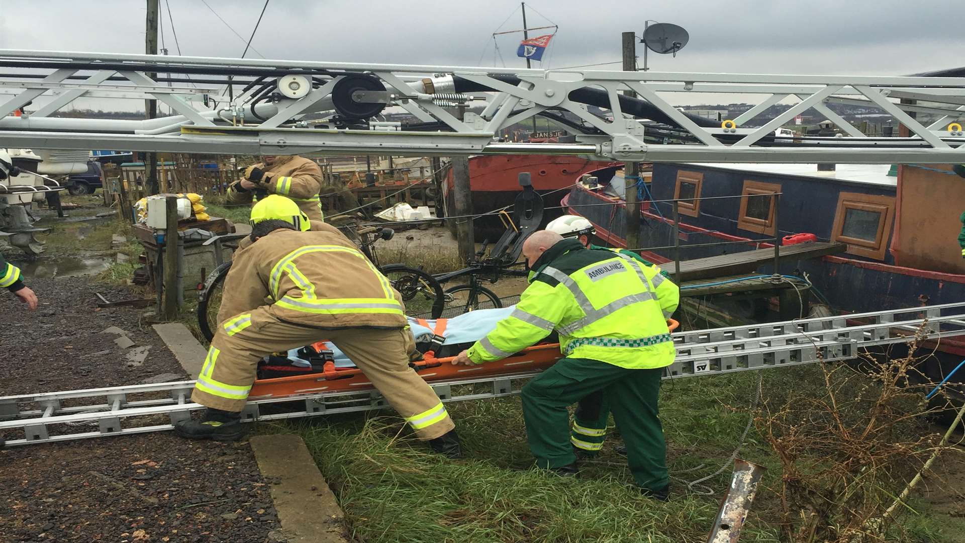 Firefighters used ladders to help the woman off of the boat