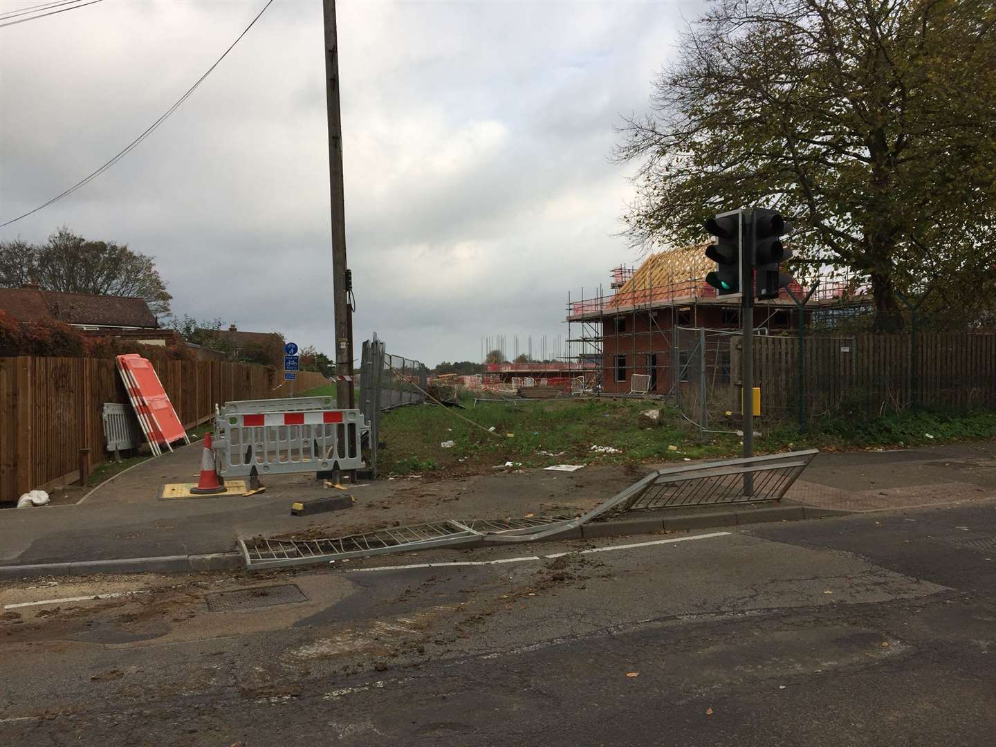 A fence linking to the nearby Taylor Wimpey Royal Parade development has been smashed down