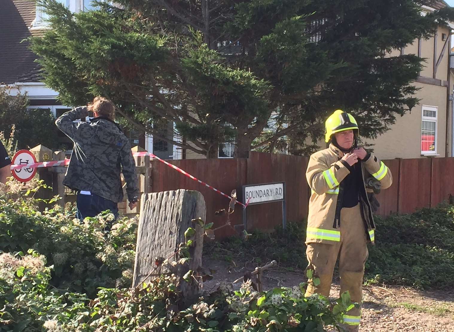 A firefighter at the scene in Boundary Road, Kingsdown Picture: Tony Flashman