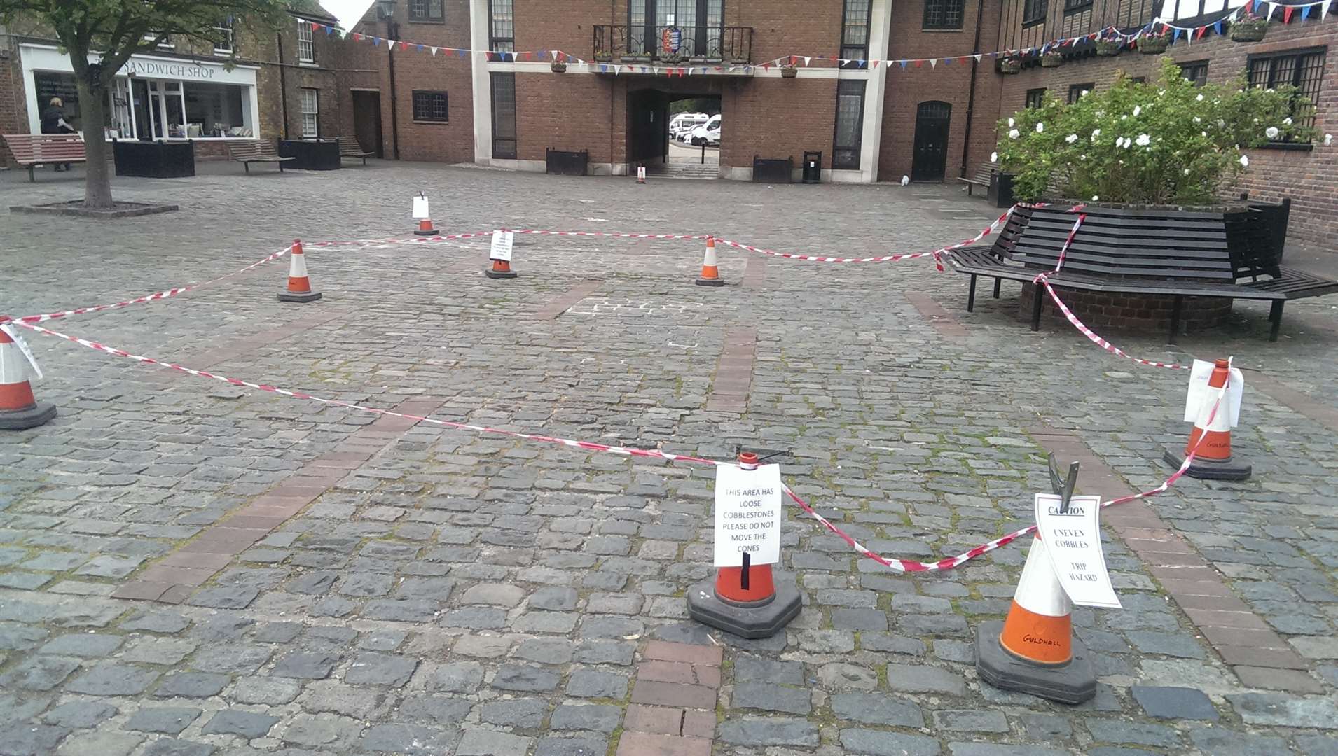 Parts of the Guildhall Forecourt have been cordoned off due to loose cobbles