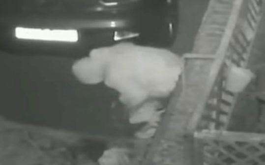 The hooded man was caught on camera squatting for a poo in Sittingbourne. Picture: Billie Beech