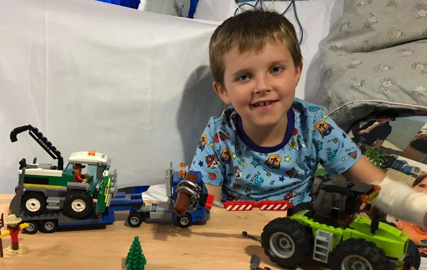 Joe Ward-Bates with Lego sets he proudly built while being treated at King's College Hospital