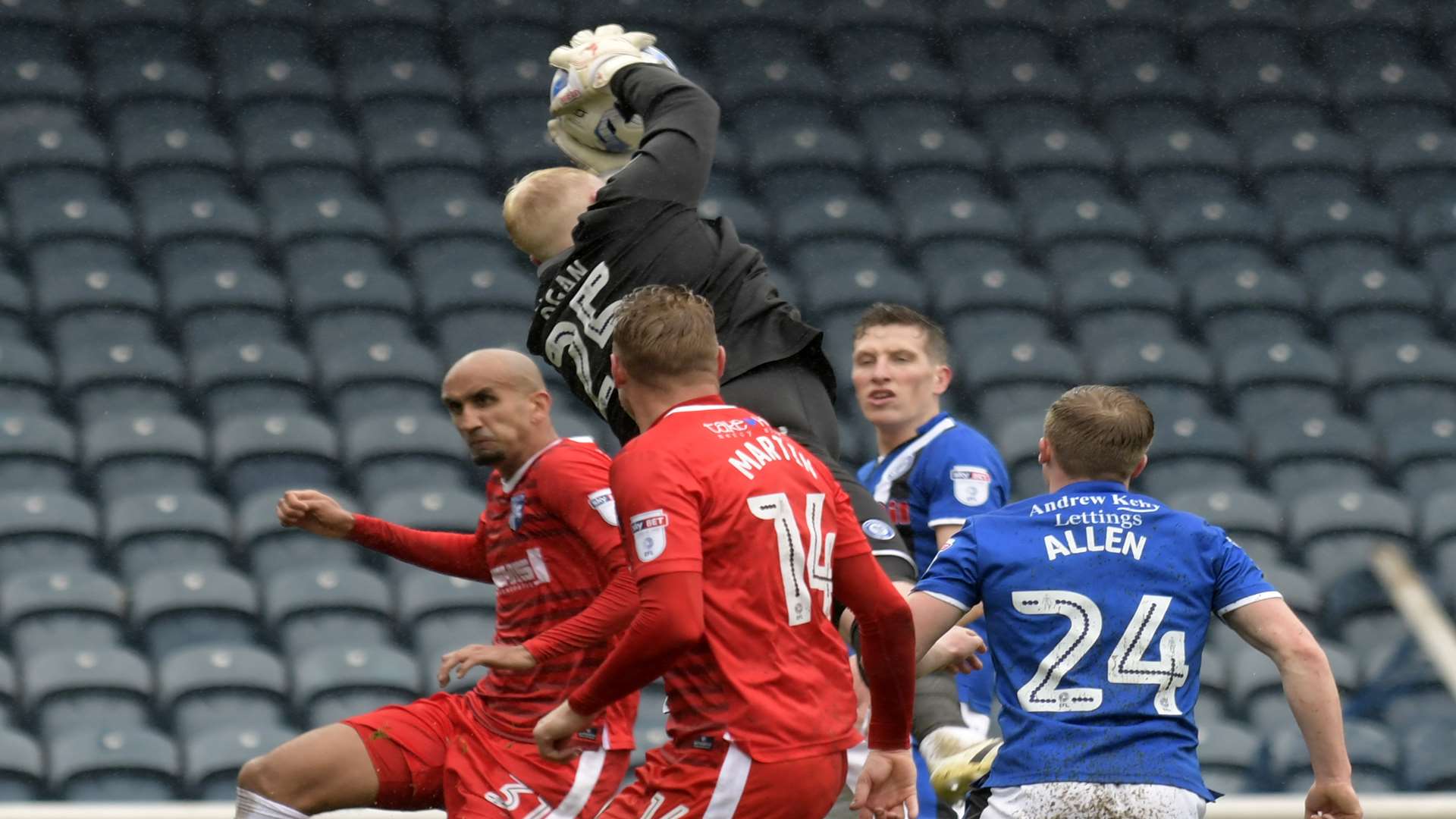 Rochdale keeper Conrad Logan keeps Gills at bay Picture: Barry Goodwin