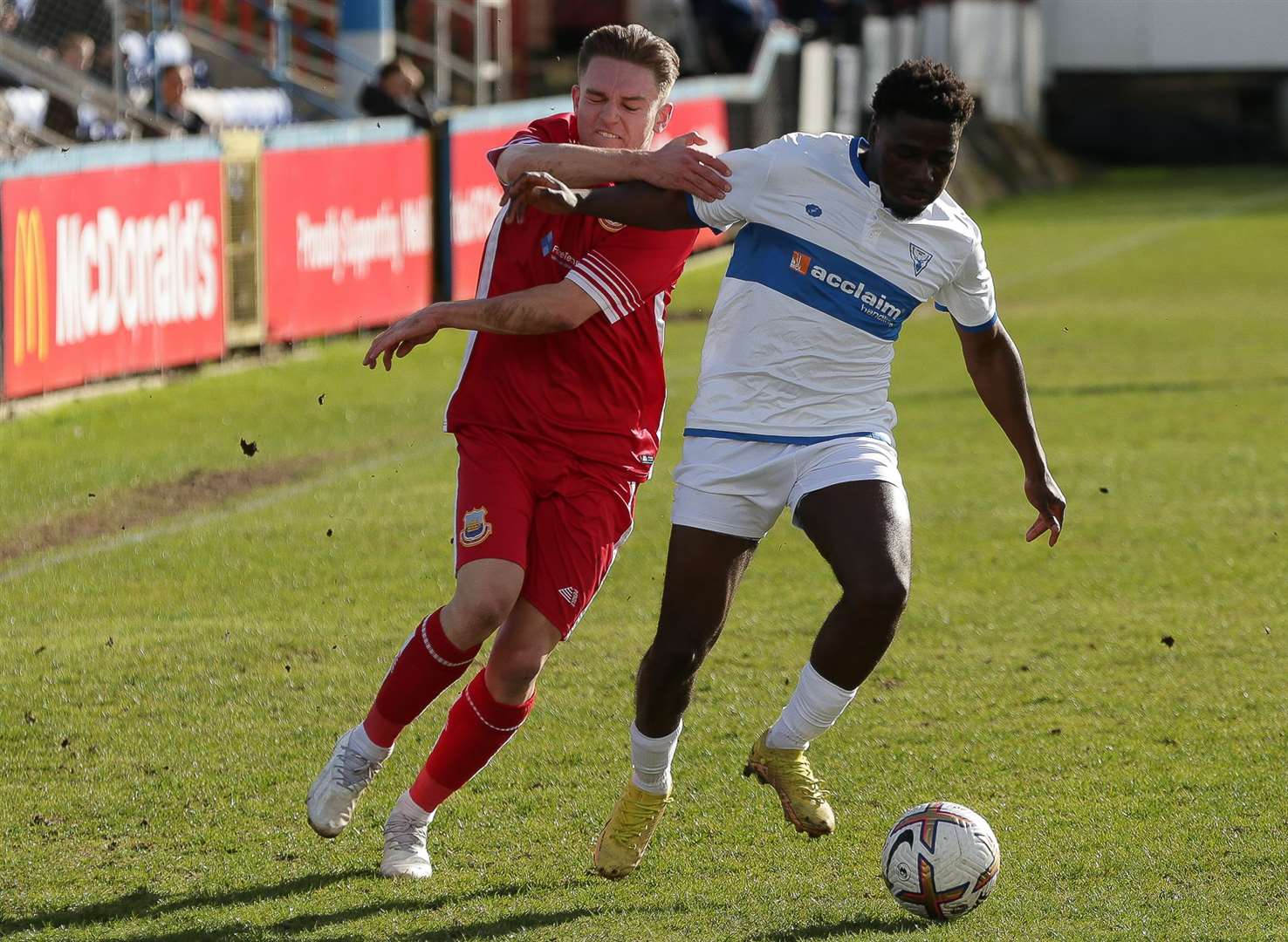 Whitstable's Josh Oliver tussles for possession. Picture: Les Biggs