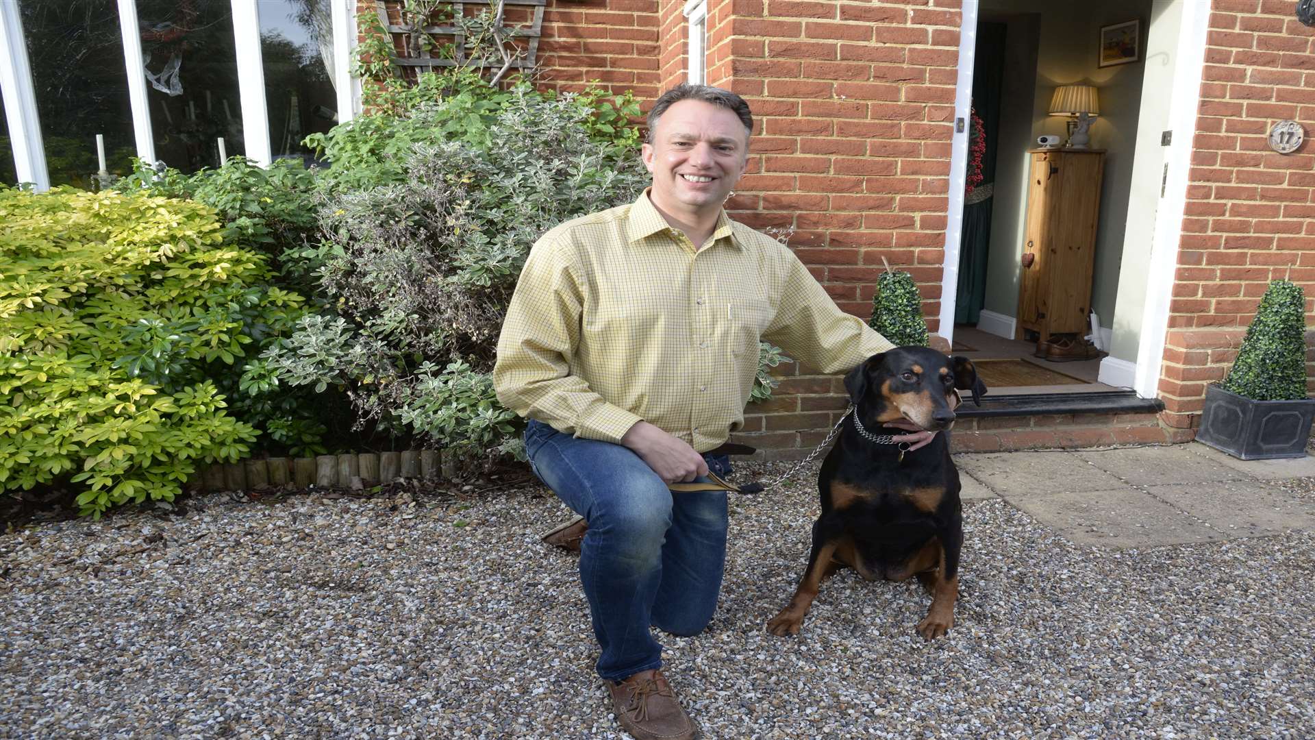 Michael Johnson and his dog Zara of Chestfield. Picture: Chris Davey