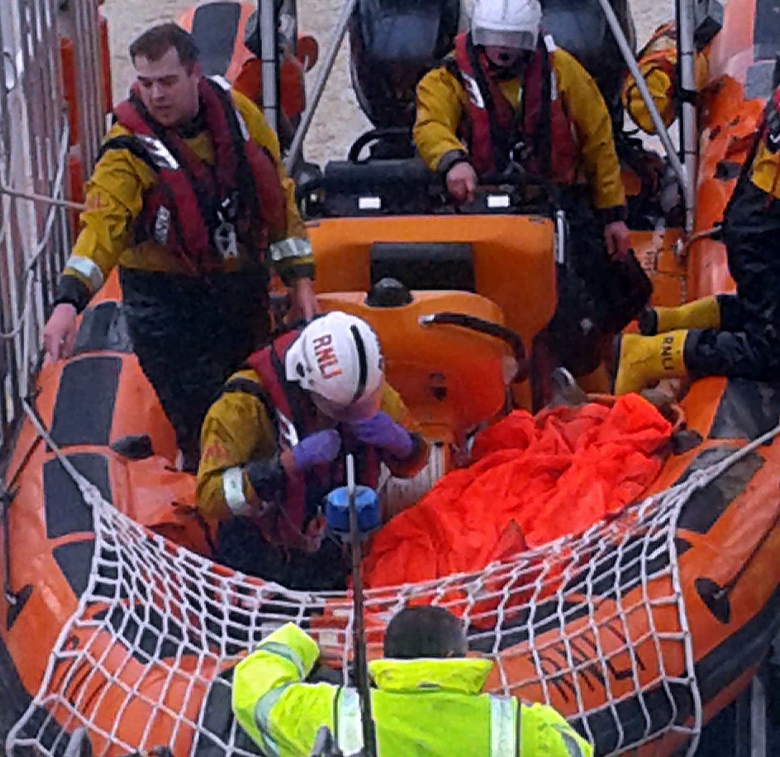 Lifeboat crews help to rescue the man, who complained of back pain. Picture: Whitstable Lifeboat