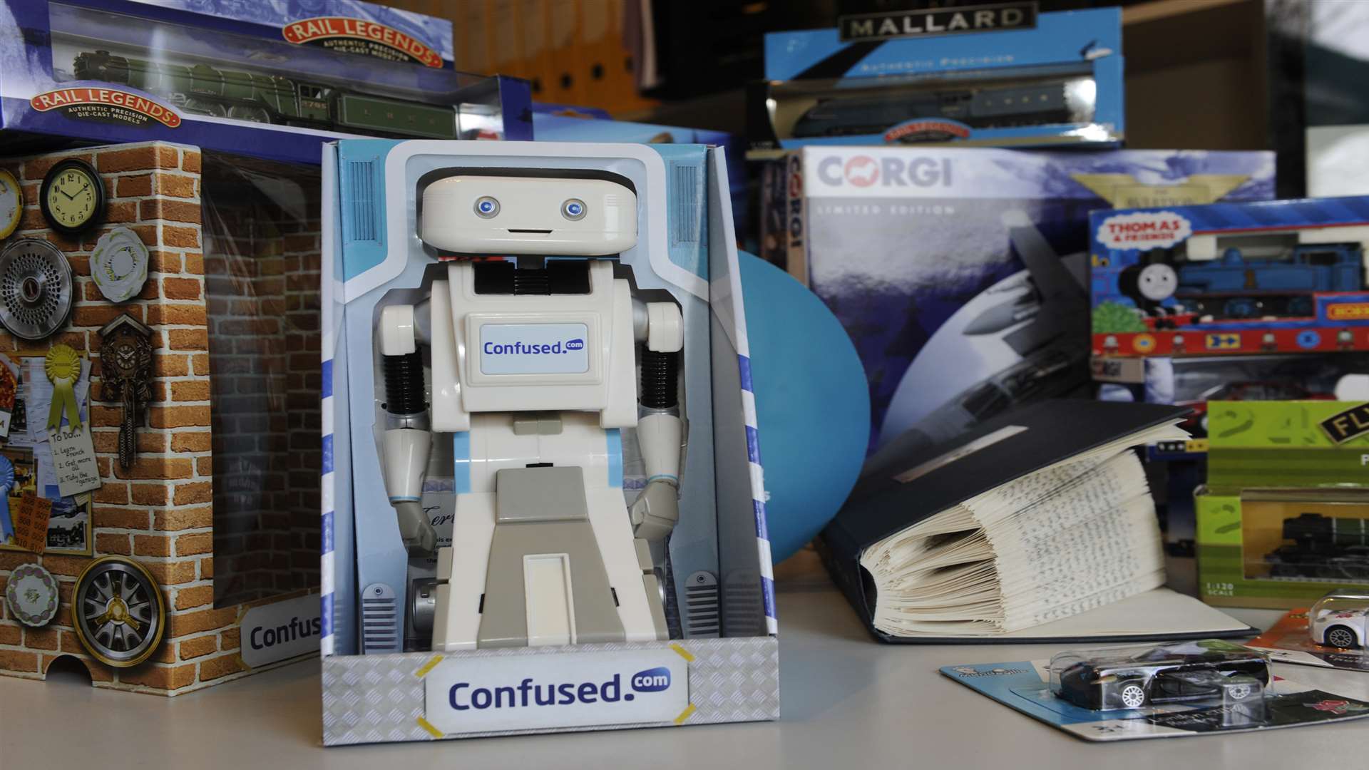 Drew Selman designed packaging for Brian the robot toys to be given to Confused.com customers