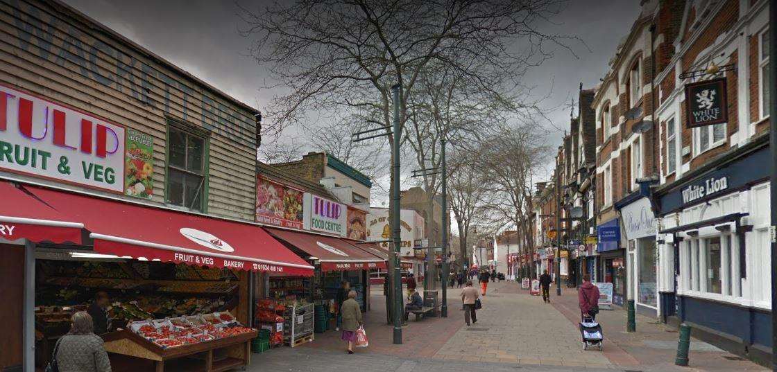 The man was stabbed in the chest in the High Street and has undergone surgery overnight