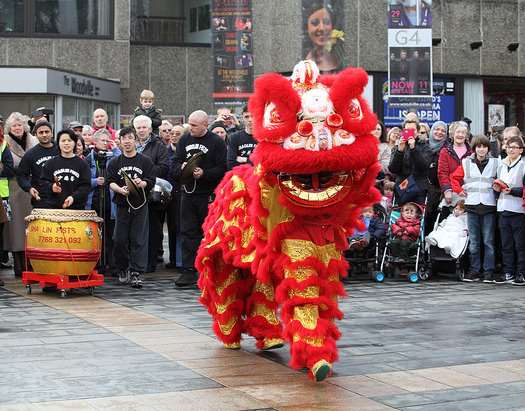 The Chinese dragon marches around Community Square