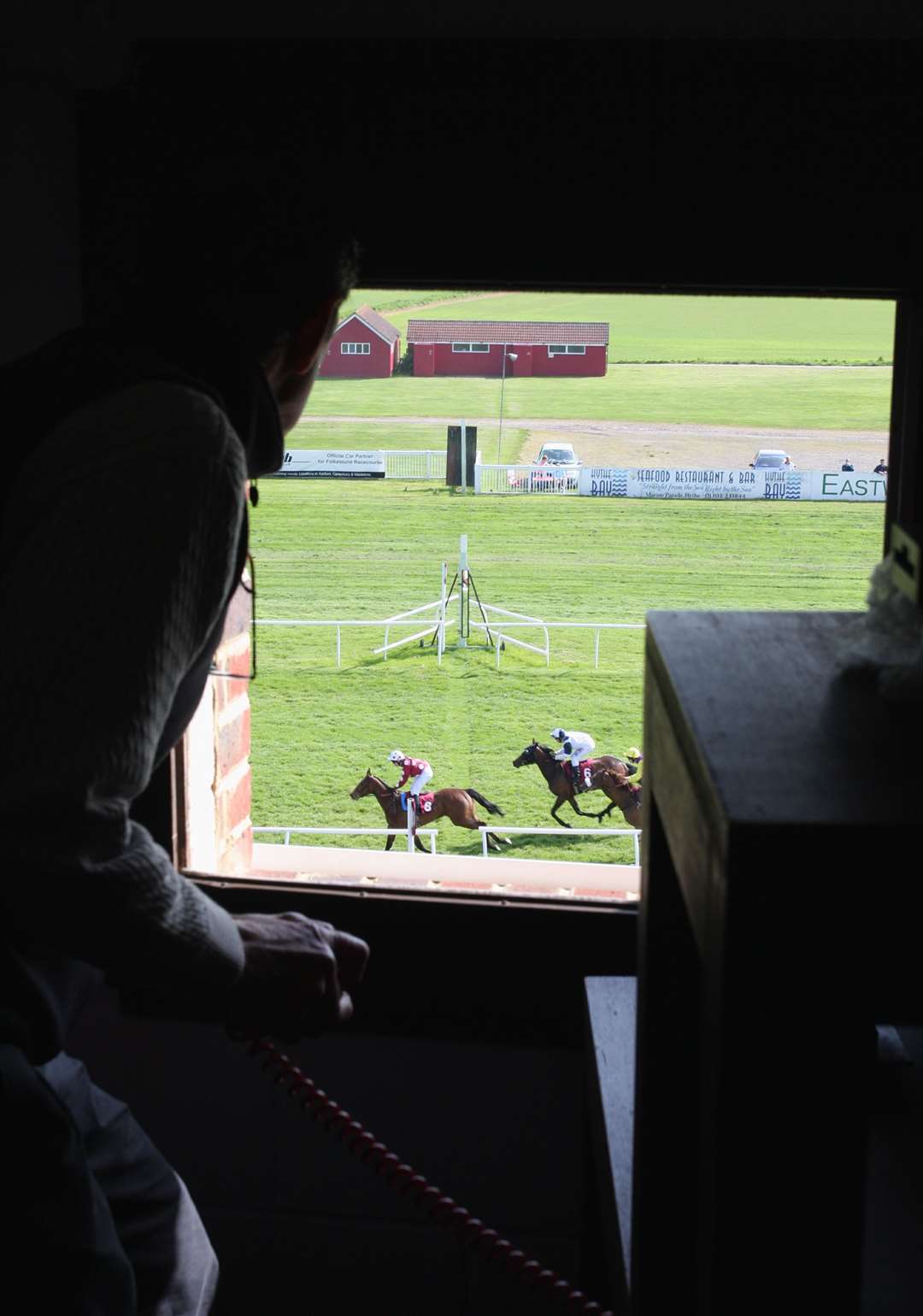 Arthur Cockburn sees the winners crossing the line in the photo finish booth in 2009. Picture: Chris Denham