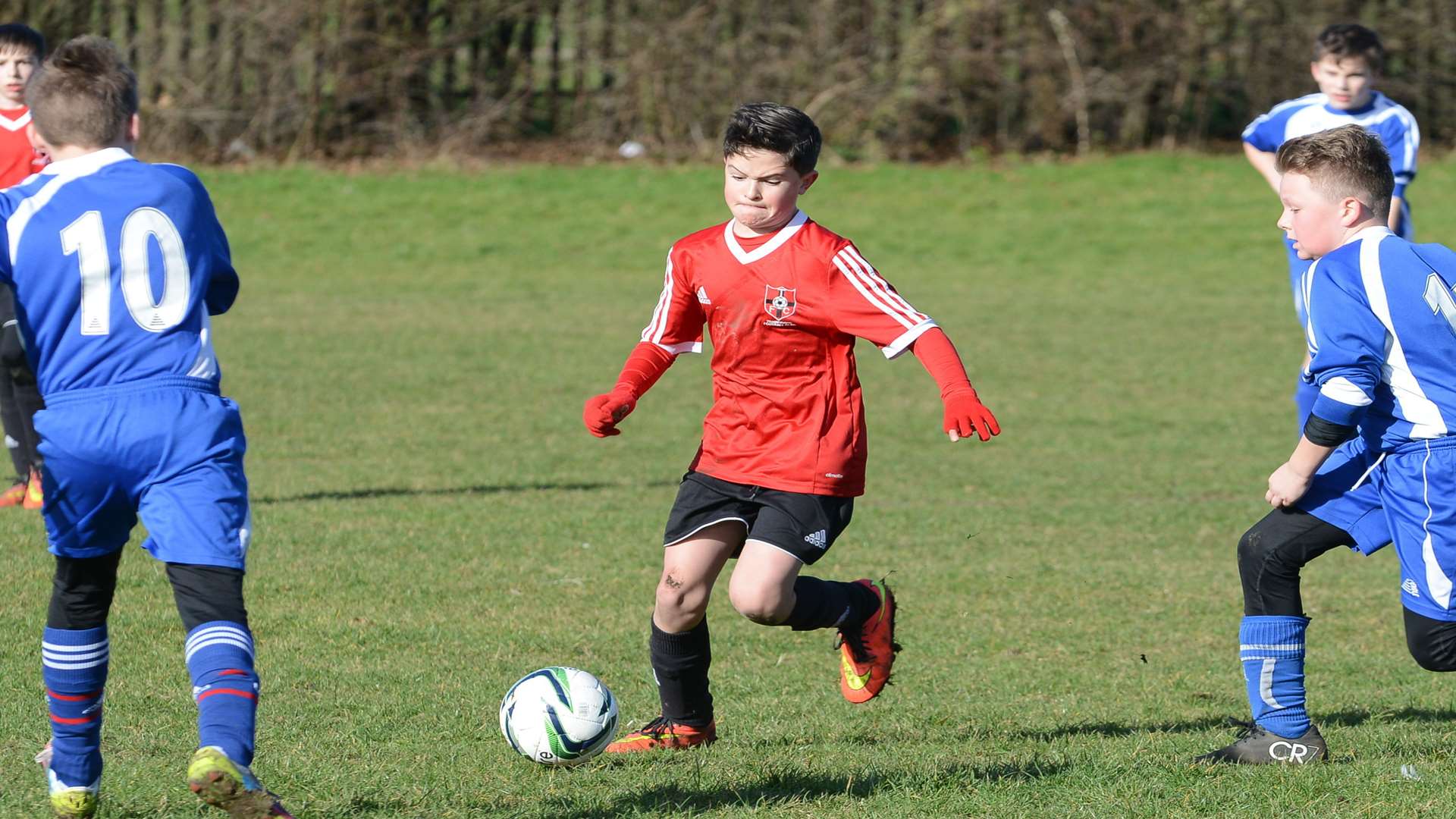 Thamesview Youth under-12s, in red, take the game to New Road in Division 1 Picture: Gary Browne