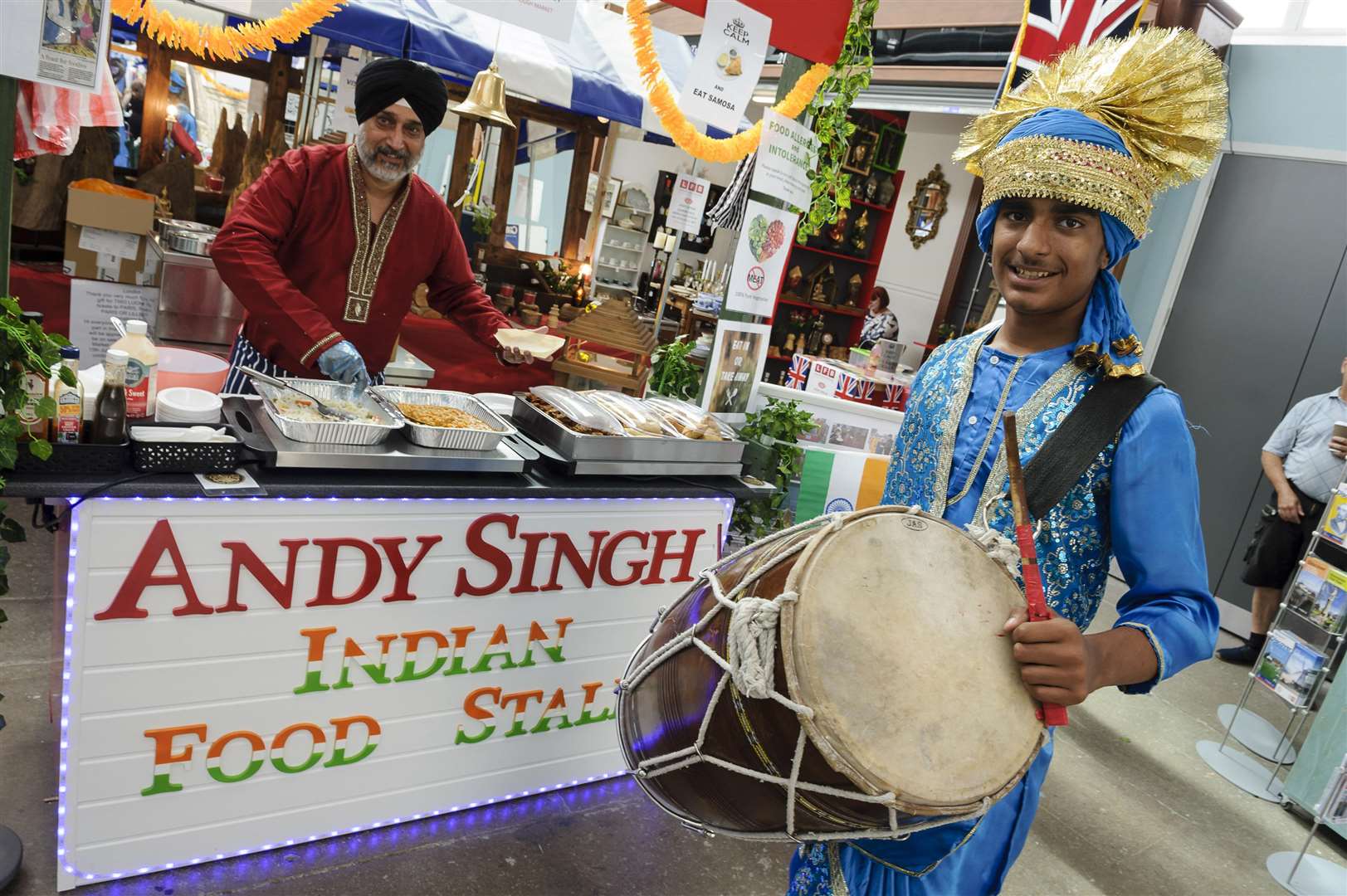 Andy Singh on his old stall with drummer Suraj Sanger helping bring in the business