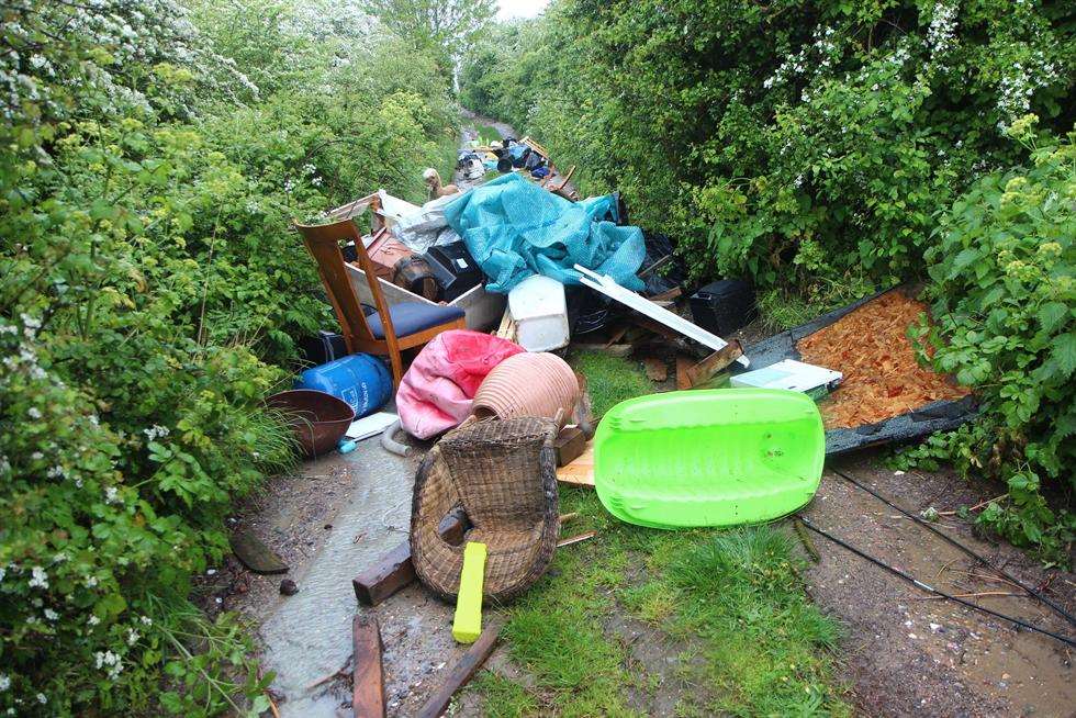Dumped rubbish is blocking the road in Augustine Road, Minster