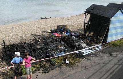 The charred remains of the beach huts on Western Esplanade damaged in Tuesday morning's fire