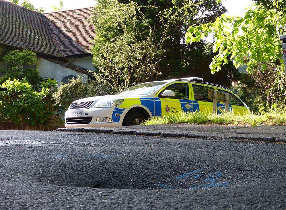 The sinking road is believed to be the result of a burst water pipe. Picture: Kent999s