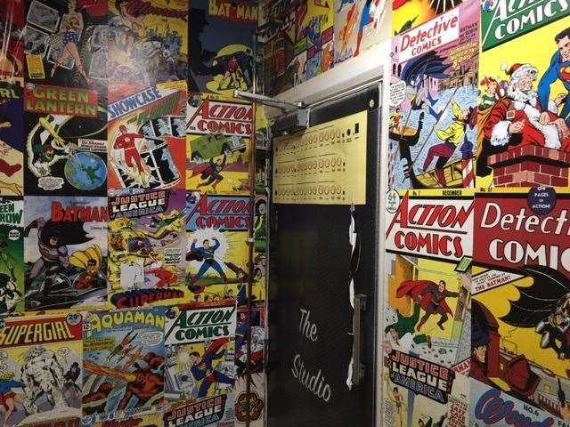Comic book heroes - the corridor to the gents and the outside area could not be more colourful