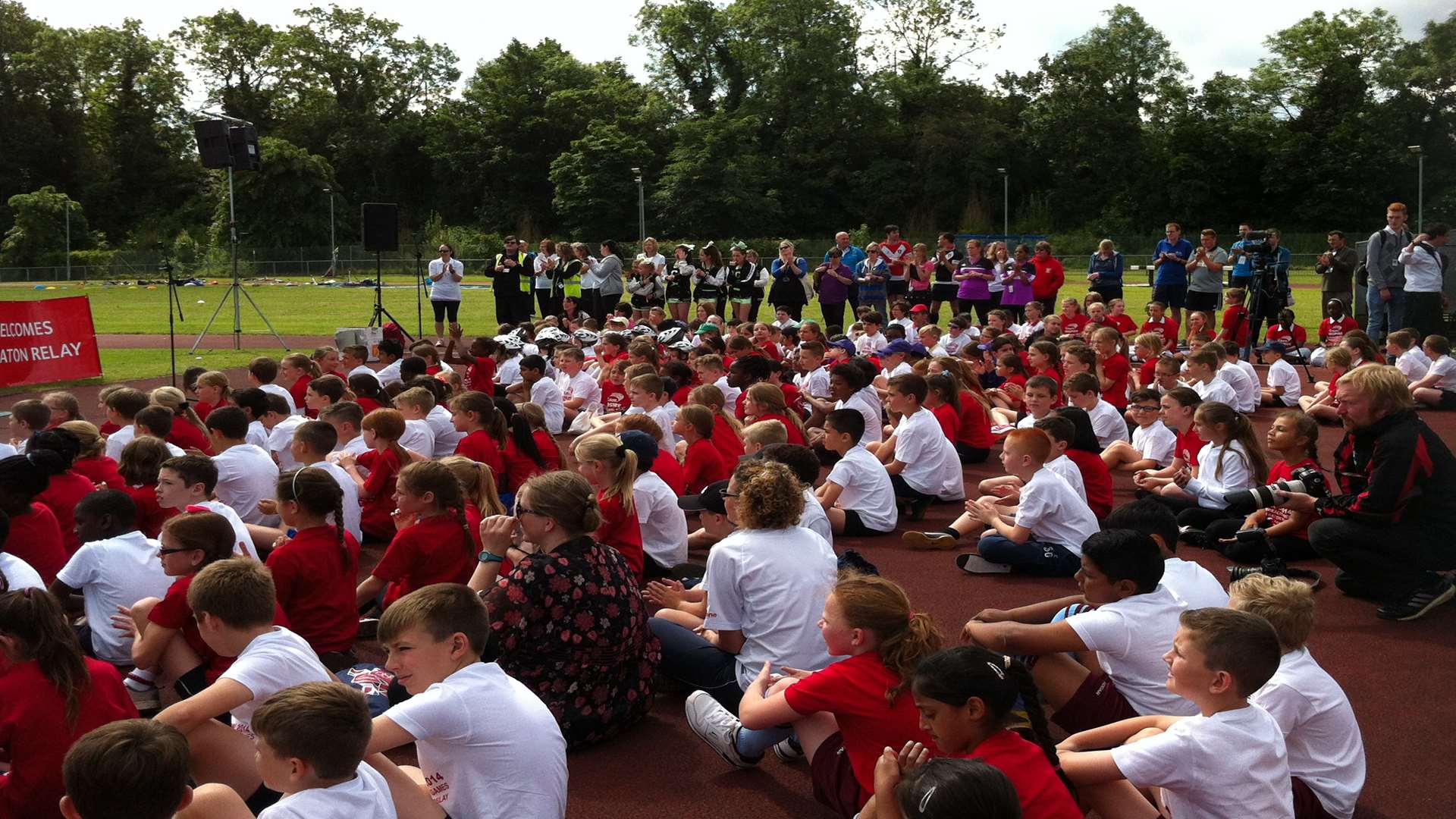 Pupils wait for the baton at Dartford athletics track