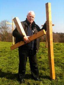 Fr Frank Moran with the broken cross