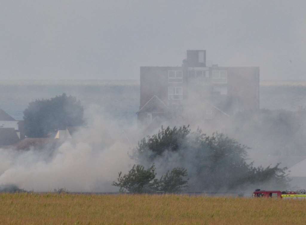 The smoke is billowing near buildings. Picture: Chris Kidman