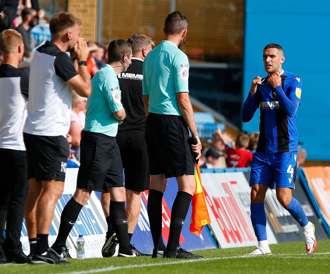 Gills midfielder Stuart O'Keefe leaves the field after being sent off against MK Dons. Picture: Andy Jones (51368023)