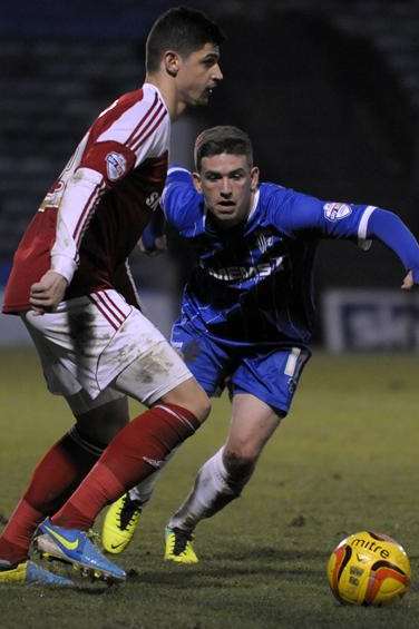 Cody McDonald closes down against Swindon. Picture: Barry Goodwin
