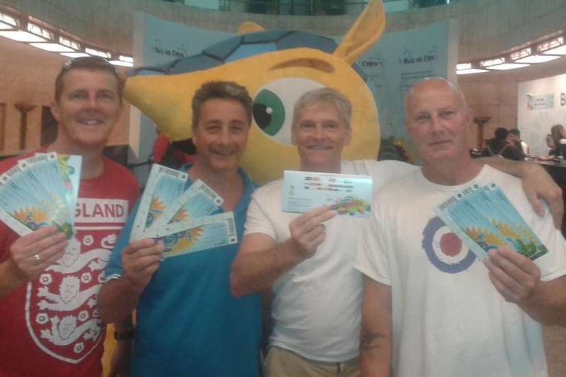 Sittingbourne builder Terry Matson (far right) and friends holding tickets for England's World Cup group games in Brazil. They're pictured at a hotel in Sao Paulo.