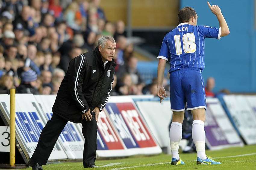 Peter Taylor gives instructions to Charlie Lee during the game against Preston. Picture: Barry Goodwin