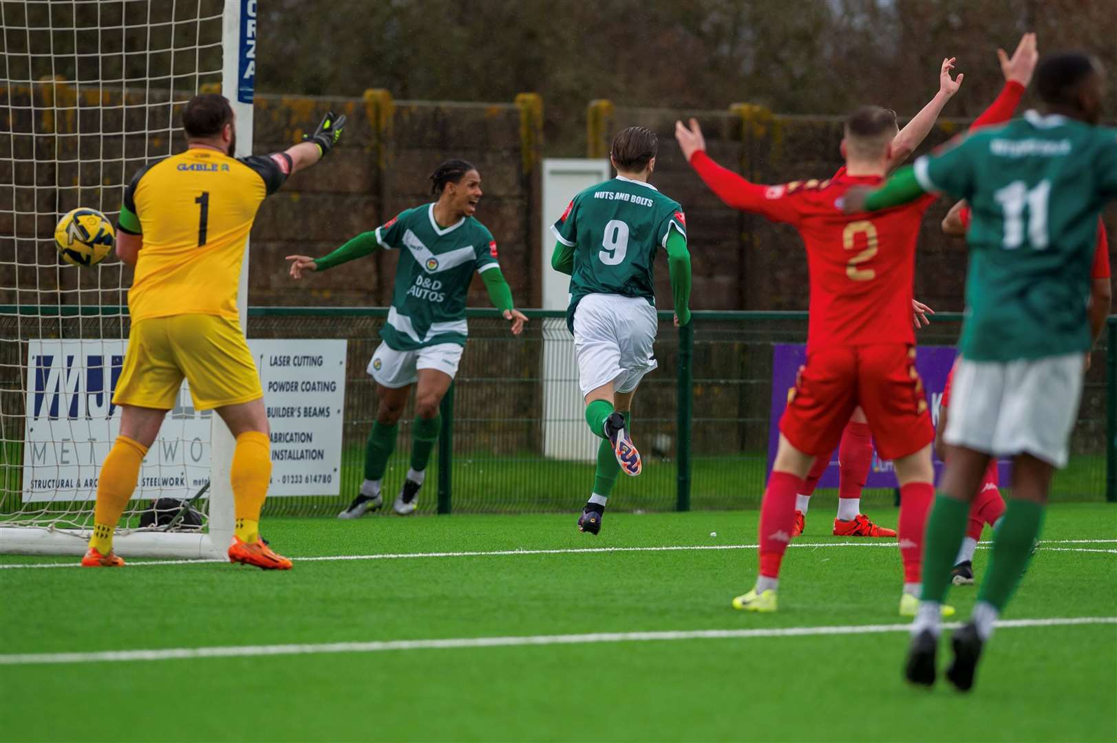 Bradley Ryan (No.9) levels for Ashford against Horndean. Picture: Ian Scammell