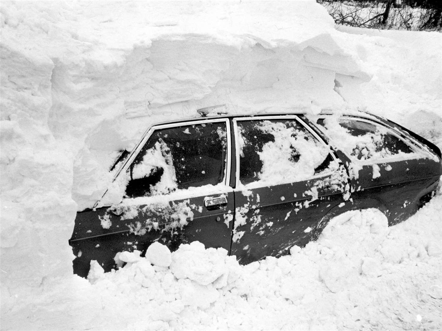Cars were buried under a mass of snow