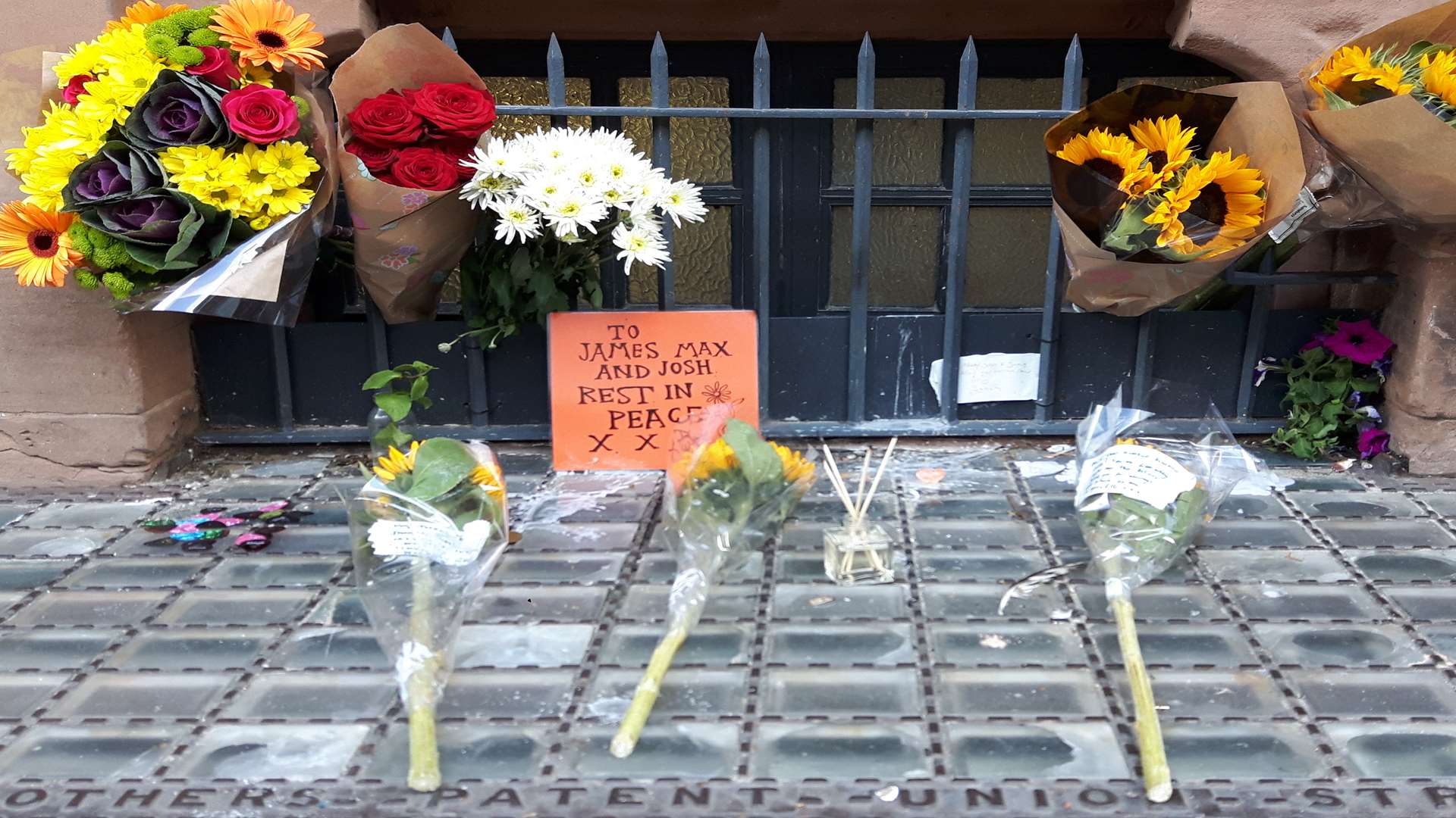 Tributes left outside the Beaney