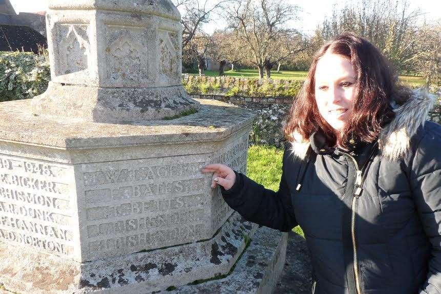 Kate Broom searches for the name of her great-uncle, Corporal Walter Ager, on Newington's war memorial