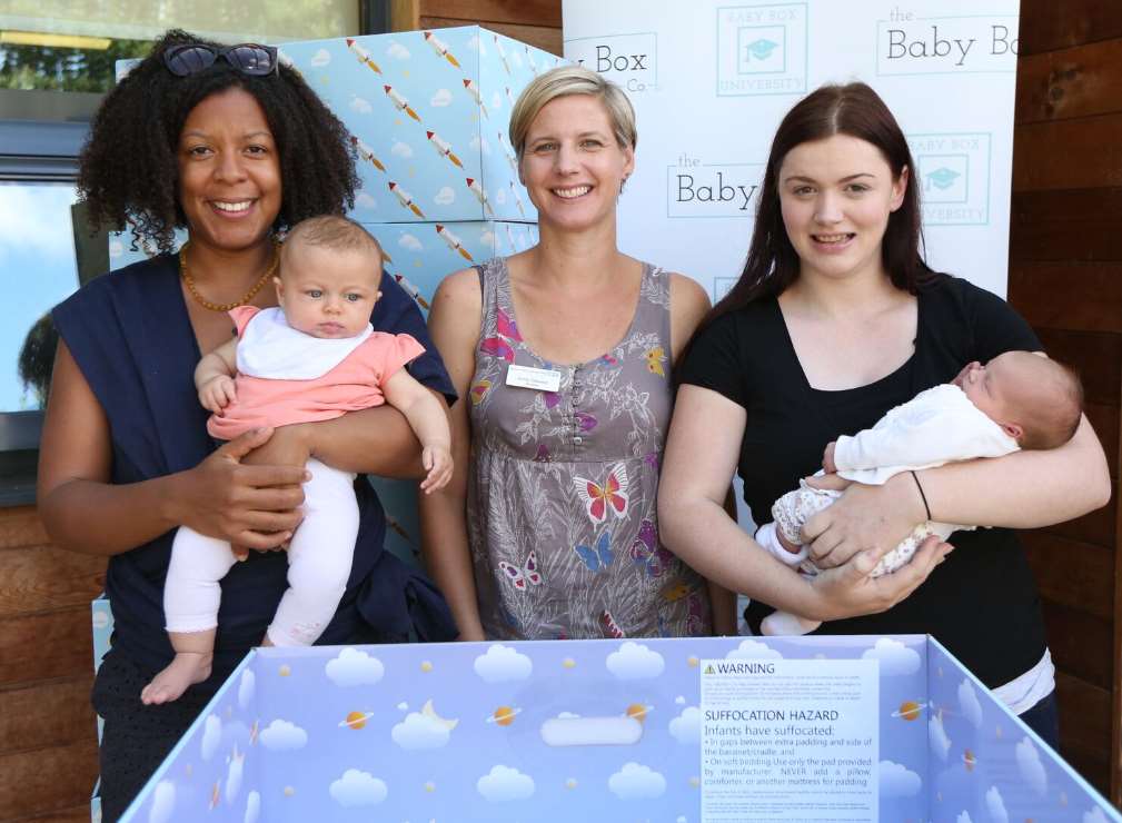 From left, mum Audrey Antione-Hart with baby Luisa-Rose, midwife Emily Steward, and mum Leigh Taylor Baby Dasie Freeman