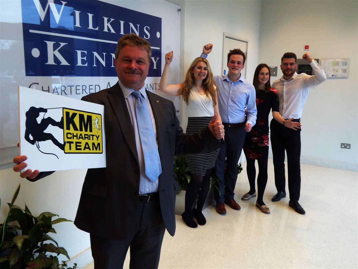 Mike Startup and the Wilkins Kennedy team are supporting the KM Abseil Challenge. (1238688)