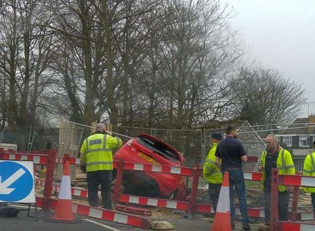 The car after it crashed into roadworks